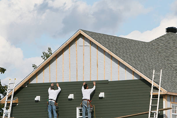 Professional Siding Installation technician working in Takoma Park, MD